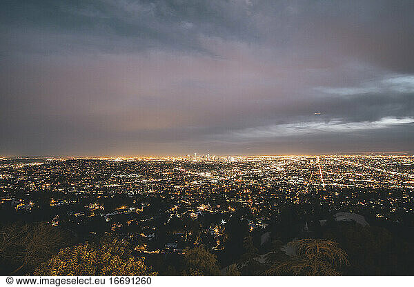 Beautiful Wide View over all of Los Angeles at Night with City Lights glowing in the distance