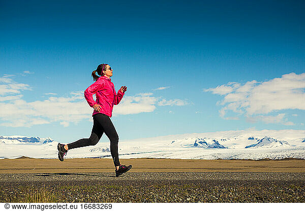 beautiful woman practicing some winter running