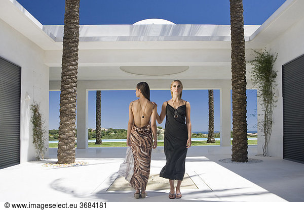 Beautiful women standing in modern villa