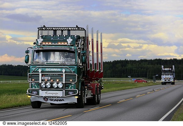 Beautifully customised green Scania 140 logging truck of K Nyberg on the road in summer. Kimito  Finland - July 7  2018.