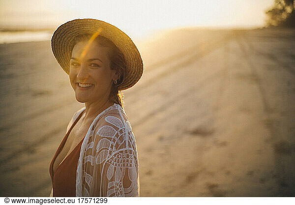beauty backlighting portrait of a blond girl in the beach