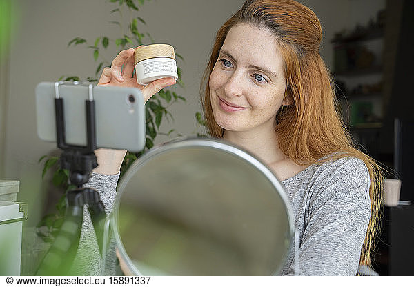 Beauty influencer showing a cosmetic product