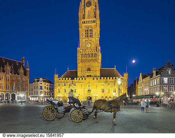 Belfort van Brugge belfry tower on the Markt square at dusk  Bruges  West Flanders  Belgium