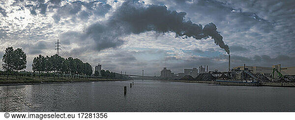 Belgium  Panorama of factory smoke rising over Canal du Centre at dawn