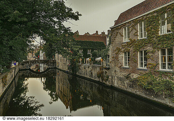 Belgium  West Flanders  Bruges  Houses reflecting in city canal