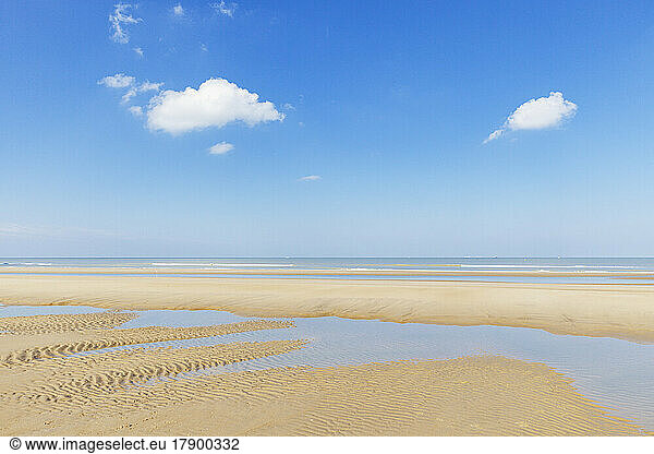 Belgium  West Flanders  Sky over rippled beach during low tide