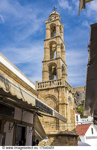 Bell tower of Church of the Holy Virgin in Lindos on sunny day  Rhodes  Greece