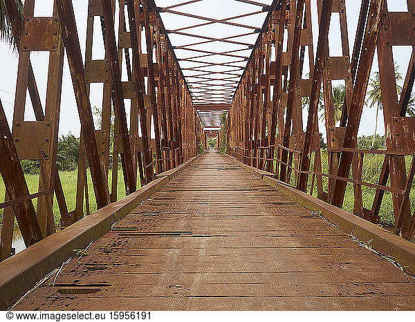 Benin  Mono Department  Grand-Popo  Diminishing perspective of old iron bridge