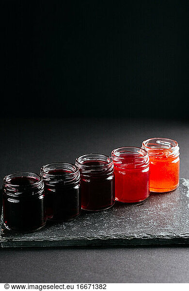 berry tinctures in shorts on black background