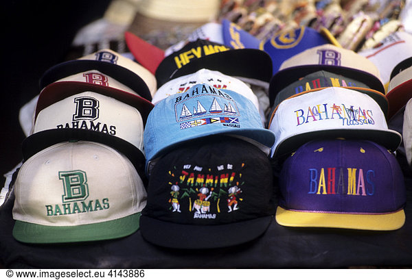BHS  Bahamas  New Povidence  Nassau: Baseball caps as souveniers at Straw Market. Independent state in the West Indies  member of Comonwealth of Nations.