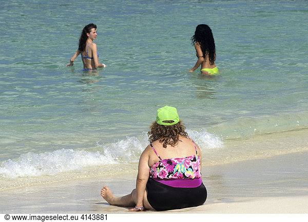 BHS  Bahamas  New Providence  Nassau: Fat woman on the beach. Independent state in the West Indies  member of Comonwealth of Nations.