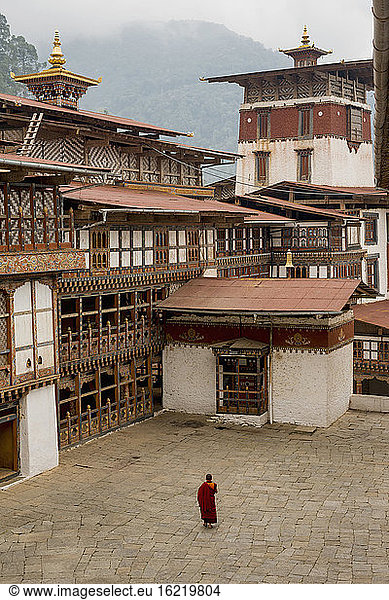 Bhutan  Buddhist in Trongsa dzong courtyard