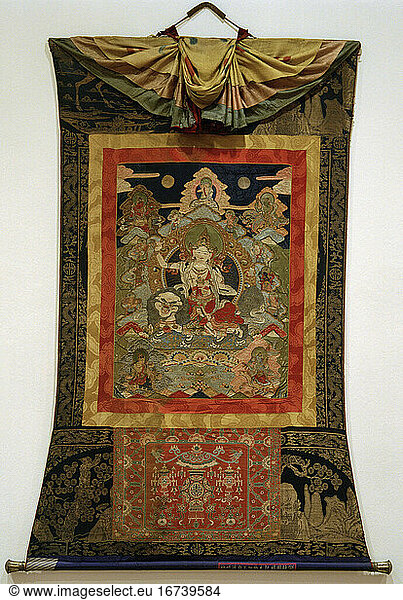 Bhutan 
19th century. – Appliqué Thangka of Tseringma and Her Four Sisters. – (The five sisters of Long Life  natural goddesses  assigned to five mountain peaks of the Himalayas  in the center Tseringma on a snow lion). Silk brocade and embroidery 
166 × 118 cm. Norbugang Lhakhang Ogma  Punakha.