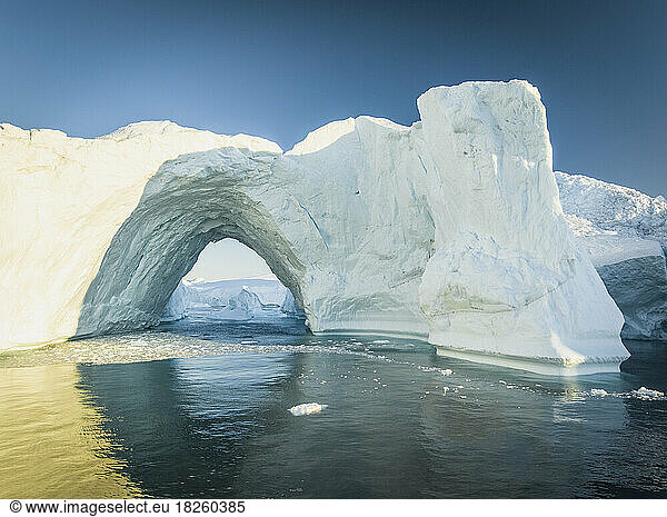 big arch in icebergs from aerial view