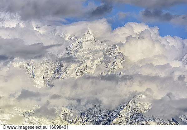 Bionnassay needle under clouds at dusk on a stormy evening  Mont Blanc Massif  Alps  France