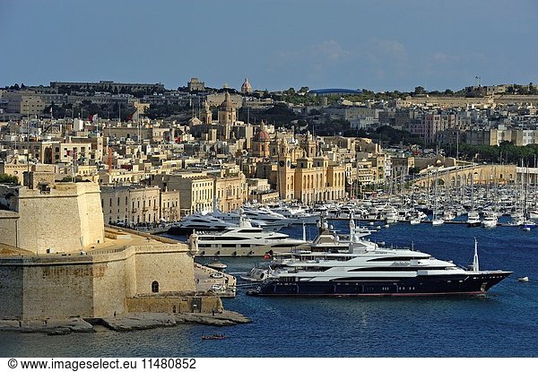 Birgu's Marina (Vittoriosa) with Fort St. Angelo in the foreground  Three Cities  Malta  Southern Europe.