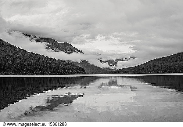 black and white image of Bowman Lake  Montana surrounded by mountains