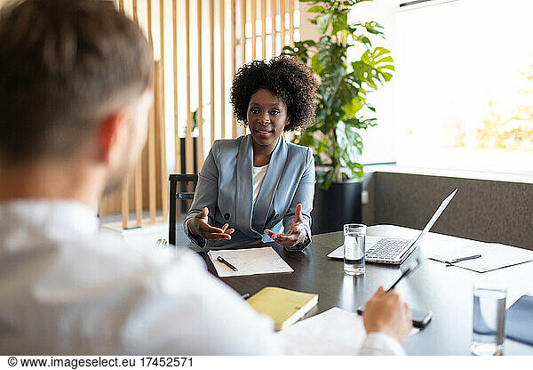 Black businesswoman recruiting new employee