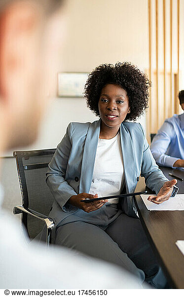 Black businesswoman talking during meeting