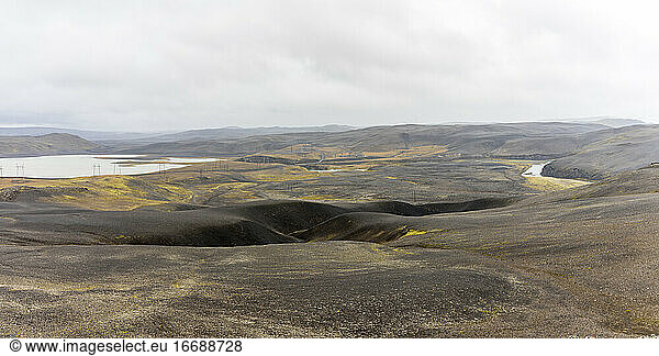 Black lava rock highlands in Iceland with rivers flowing through