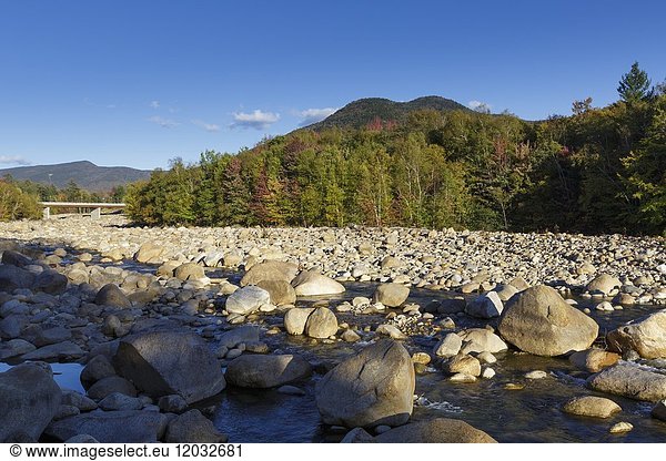 Black Mountain from the along the East Branch of the Pemigewasset River in Lincoln  New Hampshire during the autumn months.