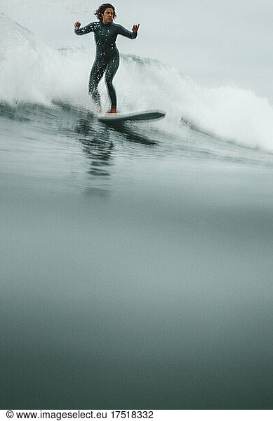 Black Woman surfing