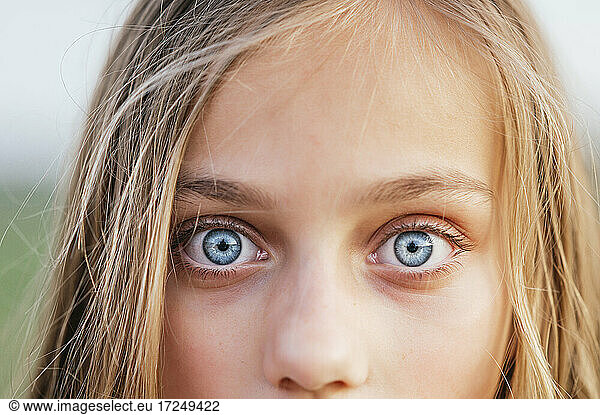 Blond girl with blue eyes