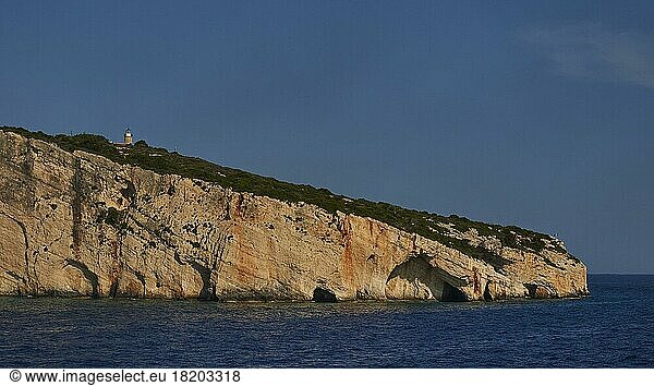 Blue Caves  morning light  lighthouse  rocky coast  northeast coast  blue cloudless sky  Zakynthos Island  Ionian Islands  Greece  Europe