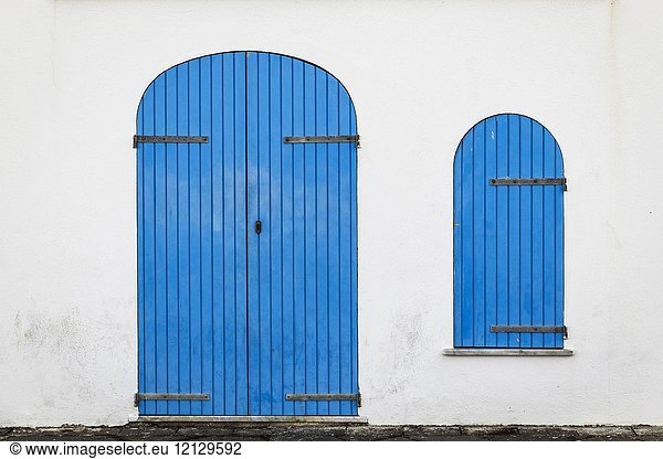 Blue door and shuttered window  Alghero  Sardinia  Italy.