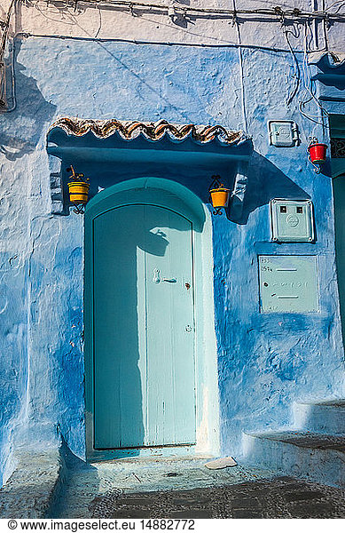 Blue painted house exterior and doorway  Chefchaouen  Morocco