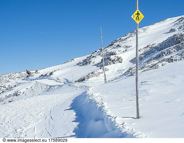 Blue sky over winter landscape  signpost from the snowshoe trail to the Dachstein Shark  Krippenstein  Salzkammergut  Upper Austria  Austria  Europe