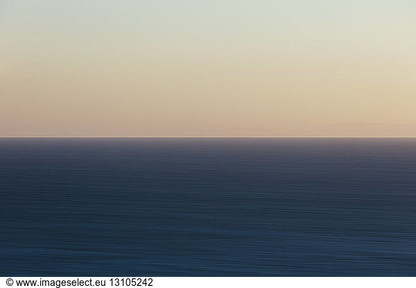 Blurred motion abstract of seascape at dawn