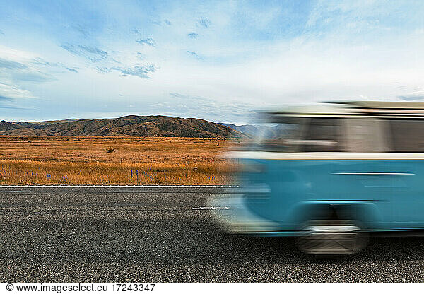 Blurred motion of bus driving along State Highway 8