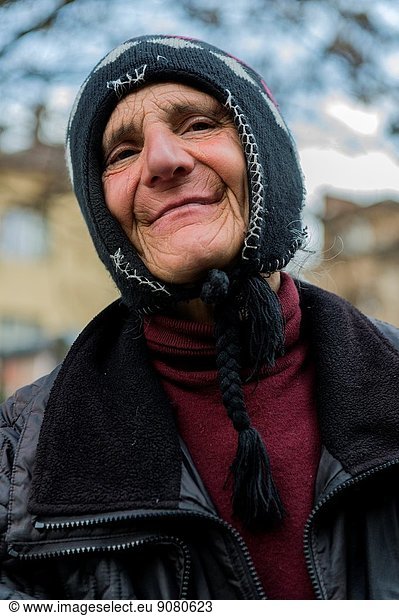 Blvd. Kniaz Aleksander Dondukov  Sofia  Bulgaria. Elder Bulgarian woman  having a pension below Bulgaria´s regular minimum wages  has to beg for money in the streets of Sofia  to supplement her monthly income.