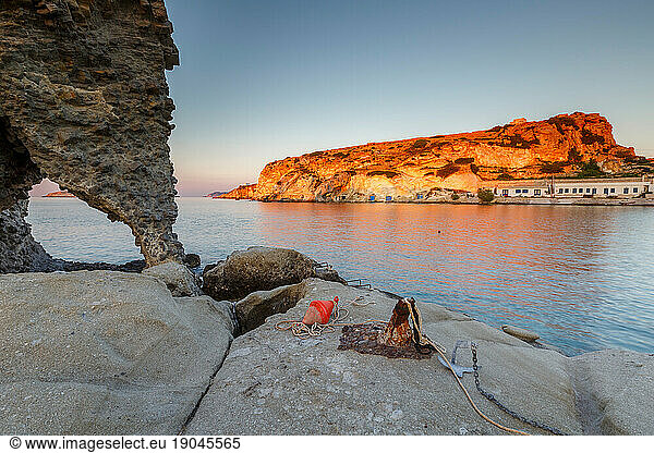 Boat houses in fishing village of Goupa on Kimolos island in Greece.