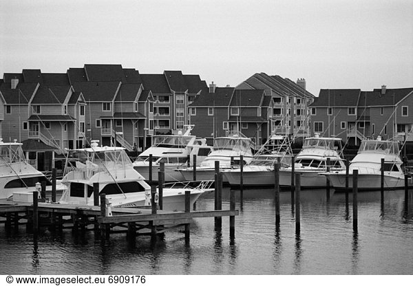 Boats in Harbor near Houses  Cape Hatteras  North Carolina  USA