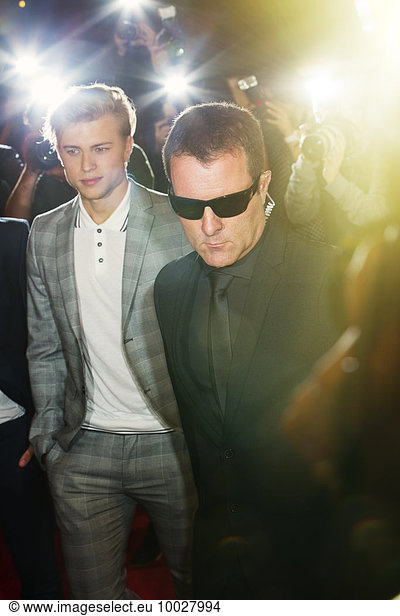 Bodyguard escorting celebrity at event