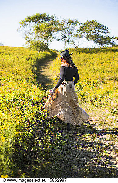 Bohemian Vintage Prairie Cowgirl Exploration of Nature Preserve Field