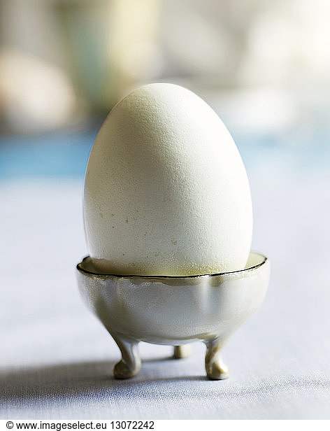Boiled Egg in container on table