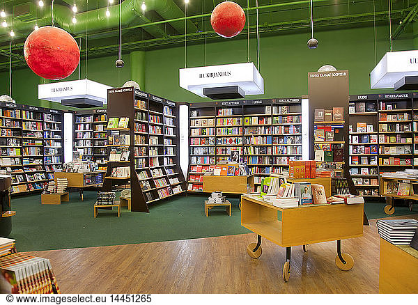 Books on shelves and tables in bookstore