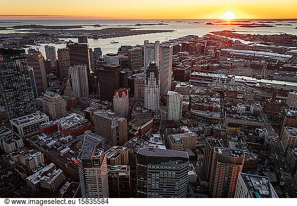 Boston aerial views from helicopter during sunrise.