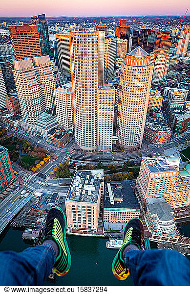 Boston cityscape views from helicopter vantage point at sunrise.