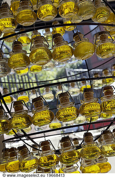 Bottles of olive oil for sale.