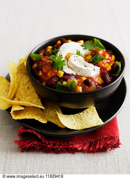 Bowl of chili with corn chips