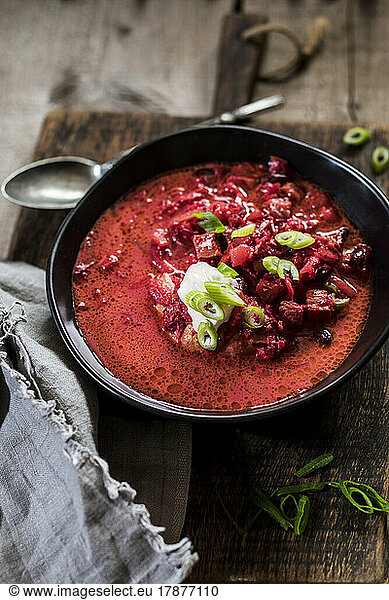 Bowl of ready-to-eat borscht with kidney beans