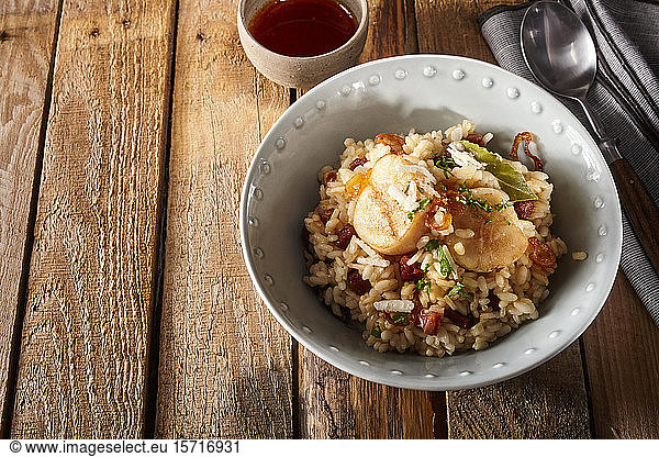 Bowl of risotto with scallops and chorizo