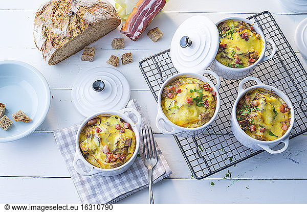 Bowls of bread soup with bacon and cheese