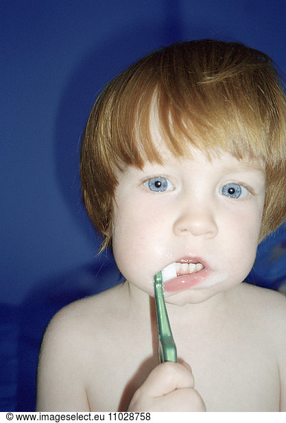 Boy Brushing his Teeth.