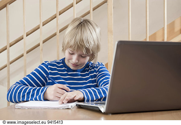 Boy doing his homework
