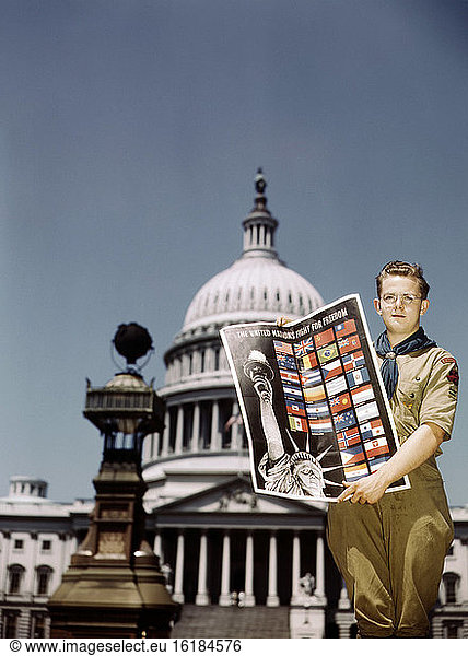 Boy Scout helping to Distribute The United Nations Fight for Freedom Posters to help War Effort  U.S. Capitol in Background  Washington  D.C.  USA  John Rous  U.S. Office of War Information  1943